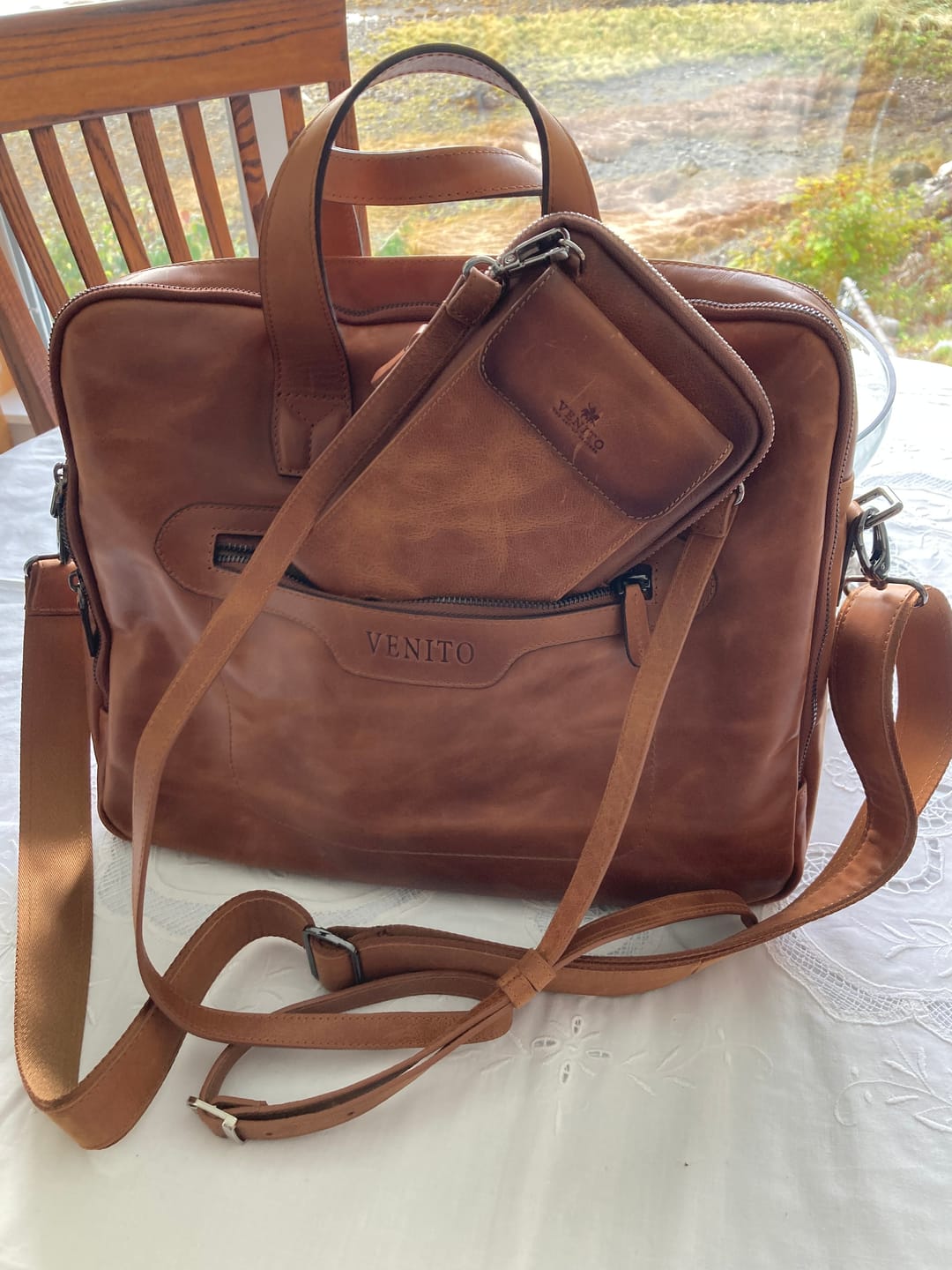 Customer photo review of Ferrara Unisex Crossbody Leather Phone Purse