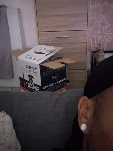 Customer photo review of MOISSANITE HALO EARRINGS.