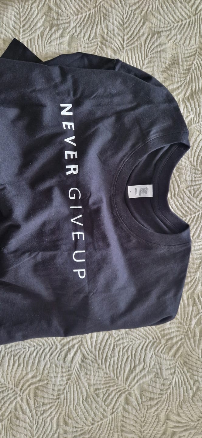 Customer photo review of Never Give Up T-shirt