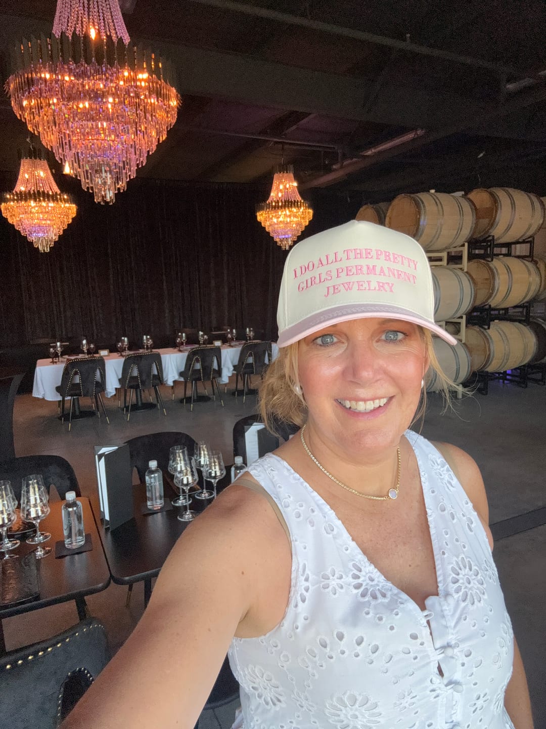 Customer photo review of I do all the pretty girls permanent jewelry- Trucker Hat