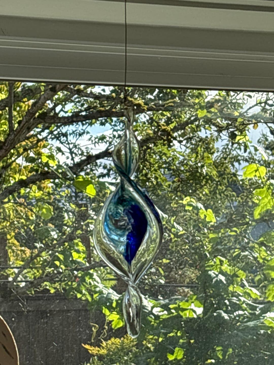 Customer photo review of Dichroic Spinner Suncatcher with Infused Cremains