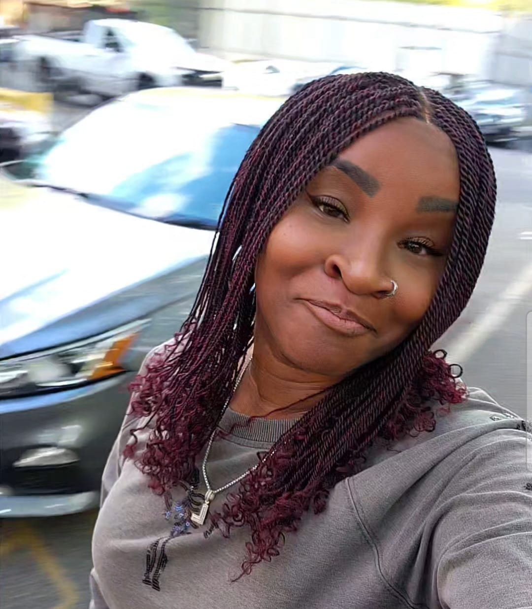 Customer photo review of Tina - Senegalese Mini Twist Braided Wig 14" Full Hand-tied Swiss HD Lace With Curly Ends - Human Baby Hair