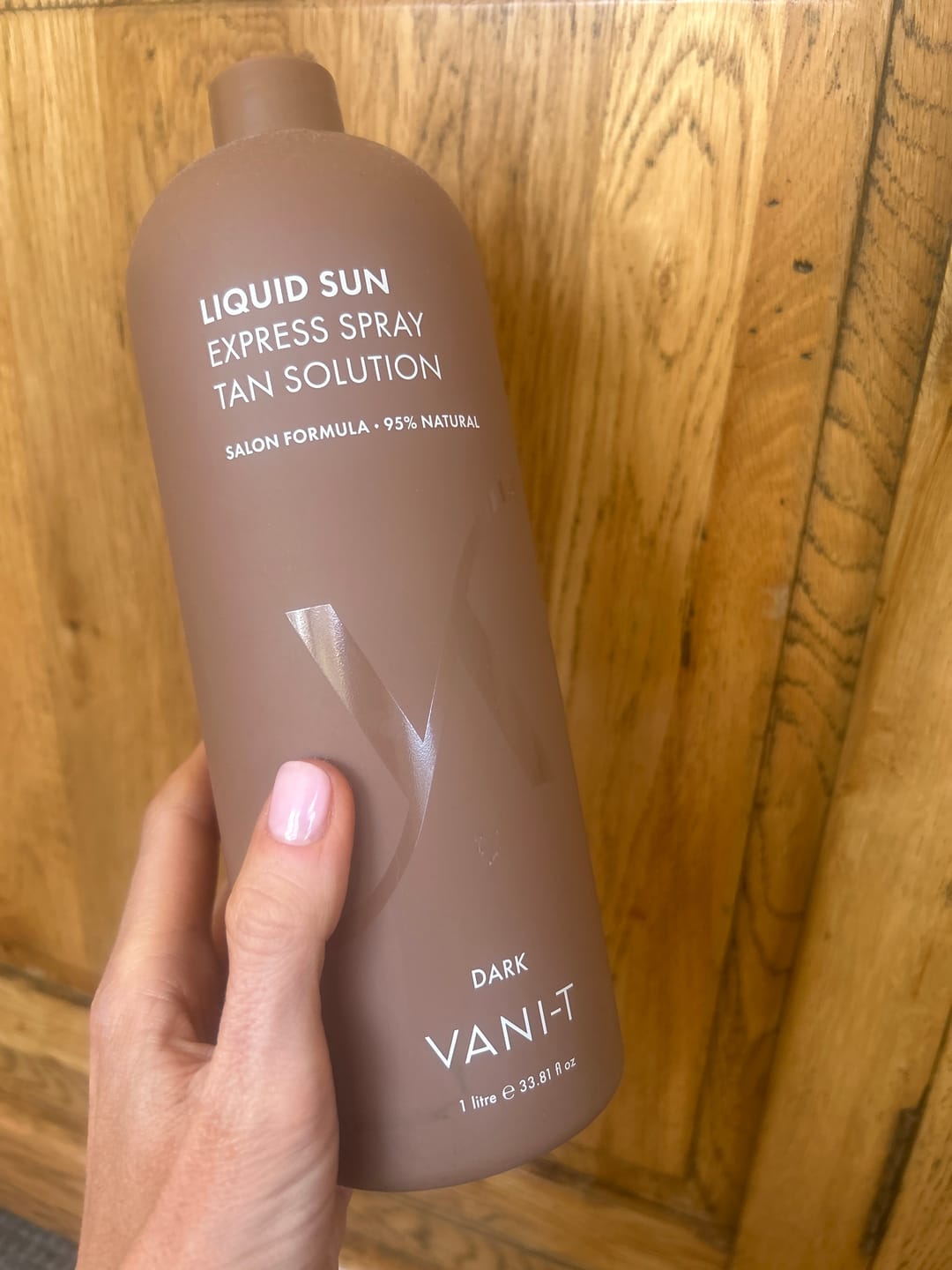Customer photo review of Liquid Sun Express Spray Tan Solution - Dark
