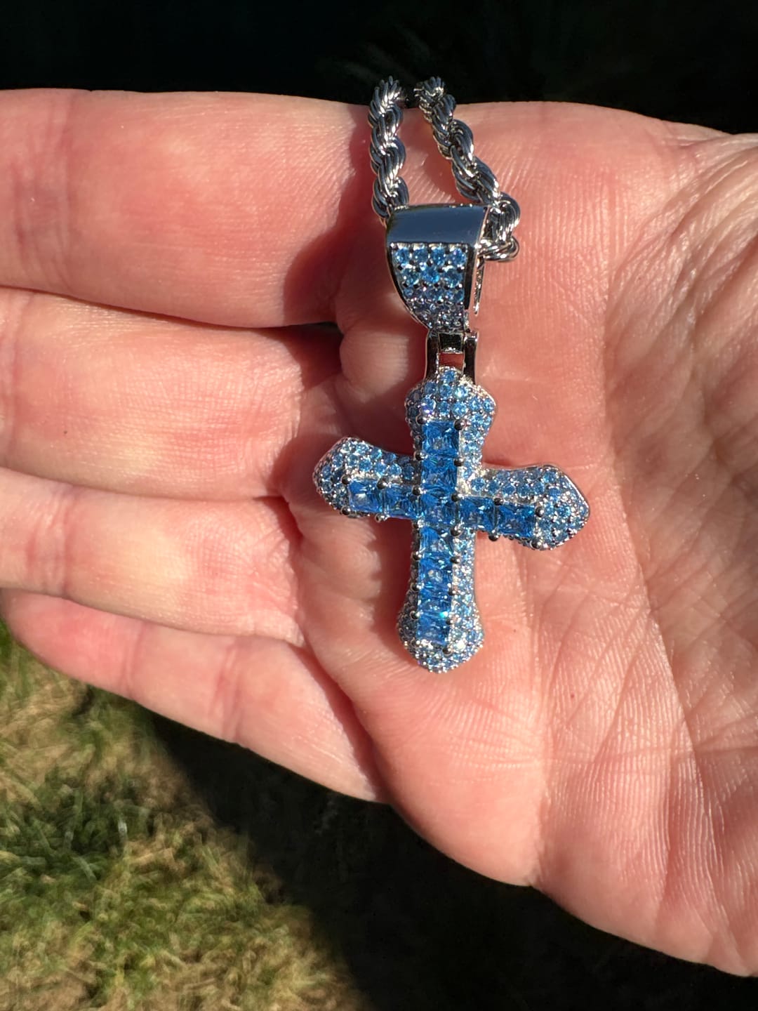 Customer photo review of BLUE CROSS PENDANT.