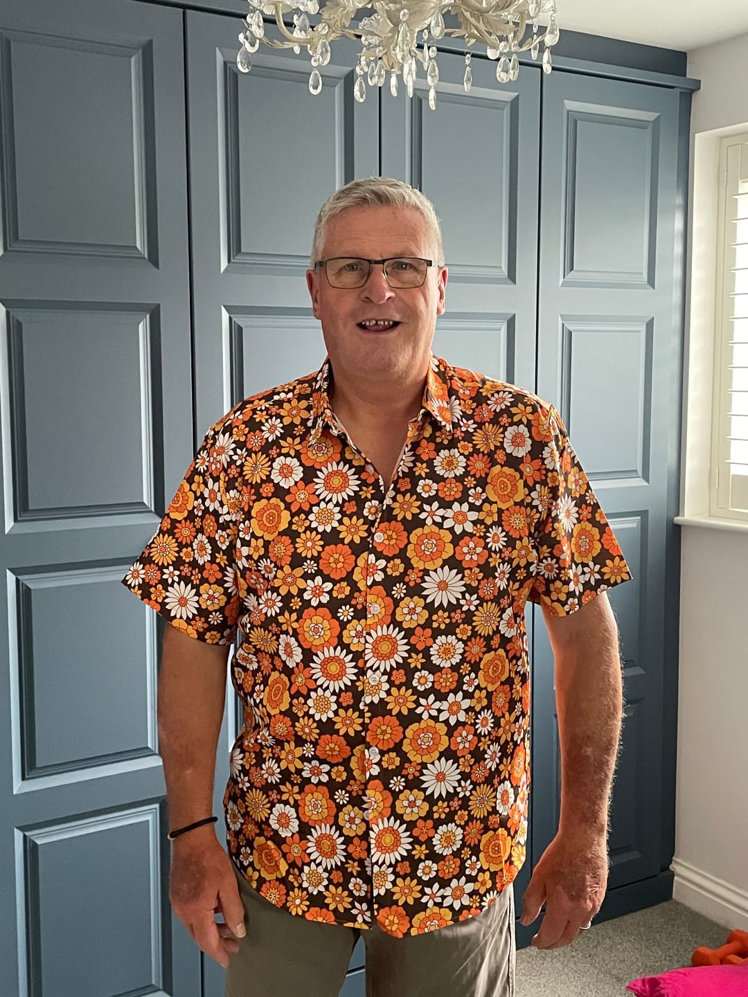 Customer photo review of Men's Floral Vintage Flower Button Up 70s Themed Disco Party Short Sleeve Beach Summer Shirt