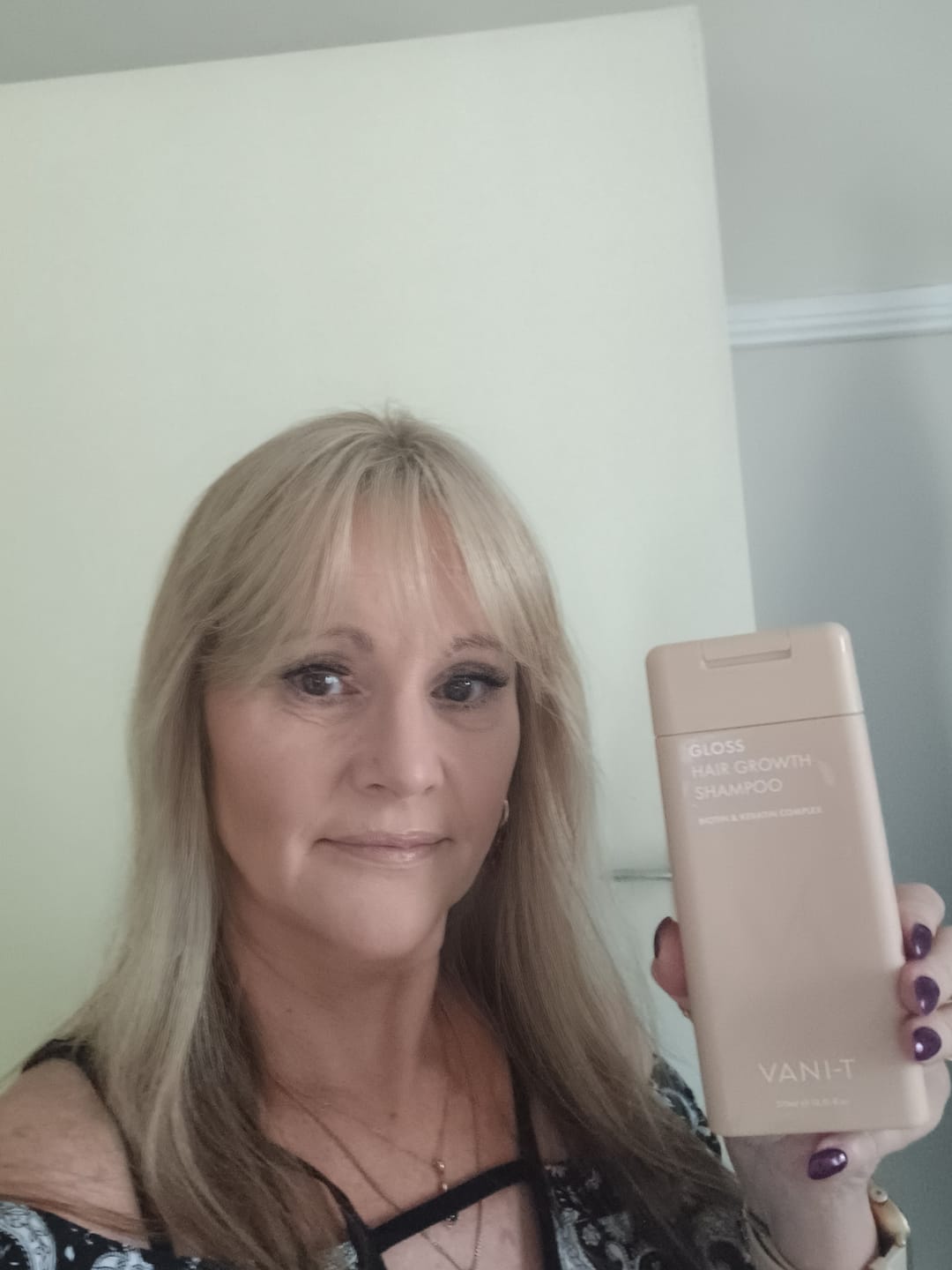 Customer photo review of Gloss Hair Growth Shampoo