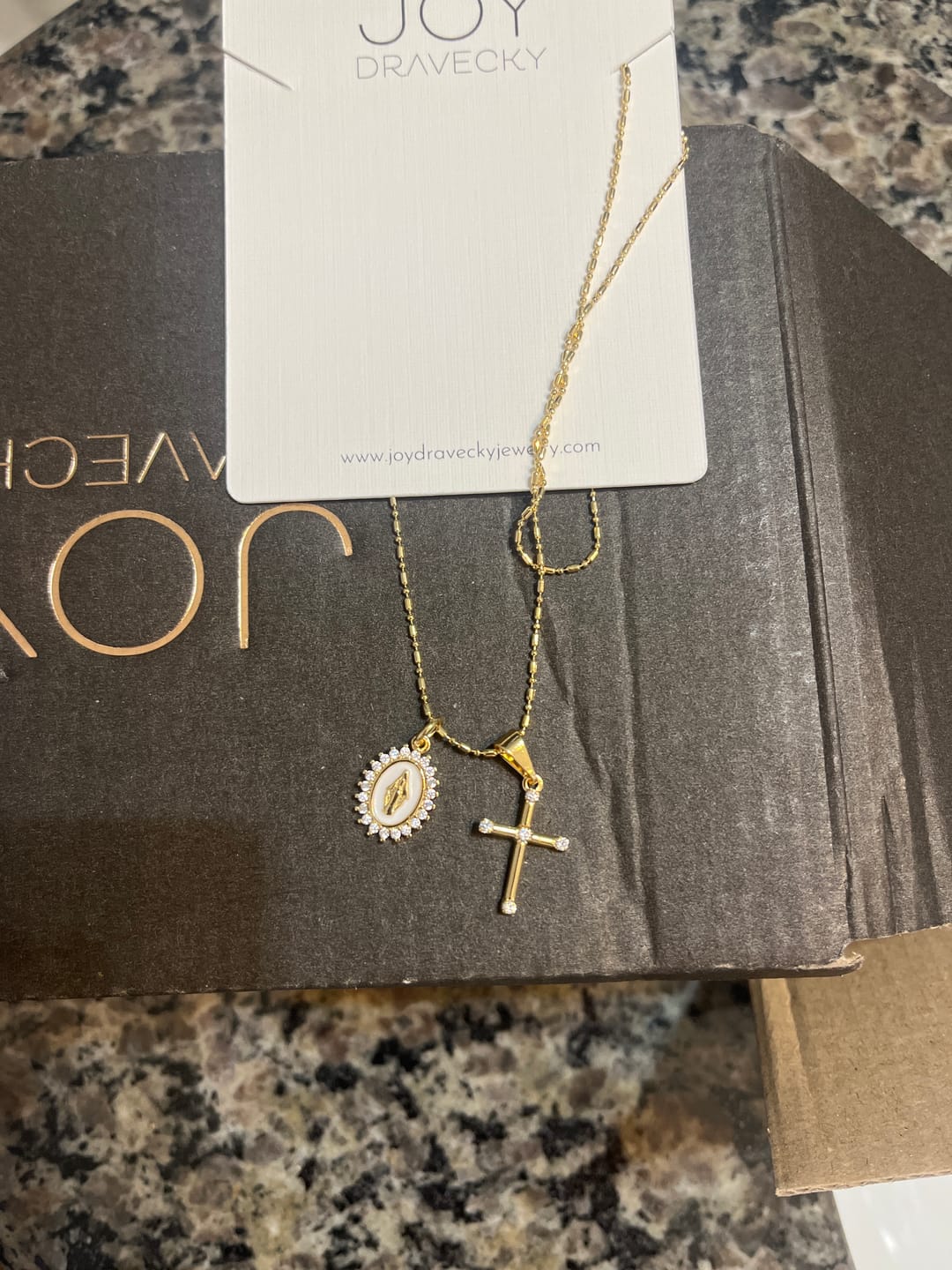 Customer photo review of Virgin Maria Multi-Charm Necklace