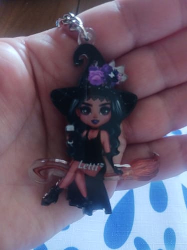 Customer photo review of Witch Riding Broom Mystical Girl-Personalized Acrylic Keychain-Best Personalized Halloween Gift