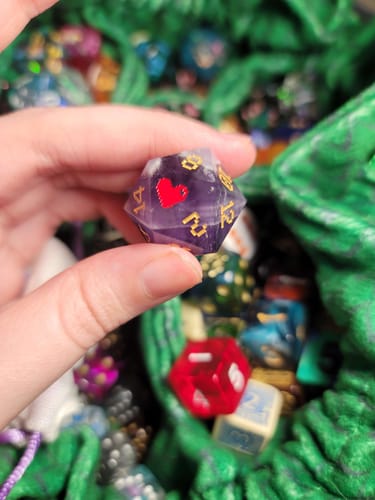 Customer photo review of URWizards D&D Amethyst Engraved Dice Set Pixel Art RPG