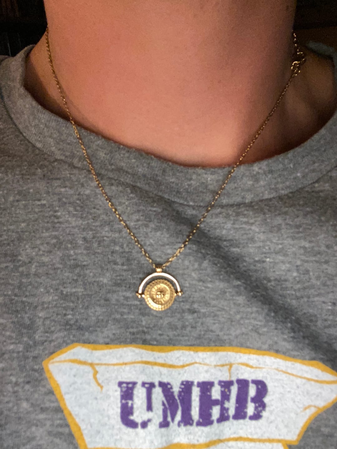 Customer photo review of Golden Sun Coin Necklace