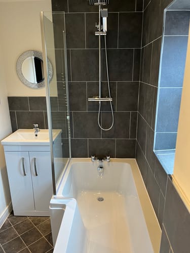 Customer photo review of Reinforced L-Shaped Square Shower Bath 1700 x 850/700 C/W Hinged 6mm Bath Screen & Front Panel
