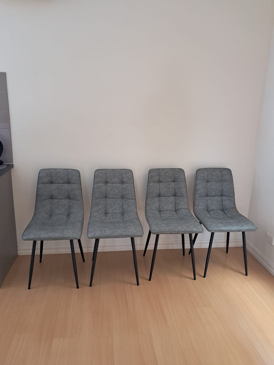 Customer photo review of Grey Leather Dining Chairs Set of 4