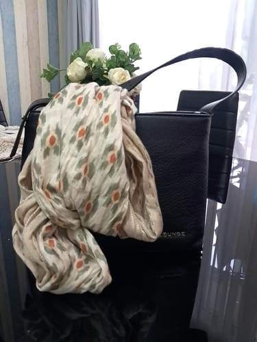 Reseña con foto de un cliente sobre Pañuelo Infinito Manchas
