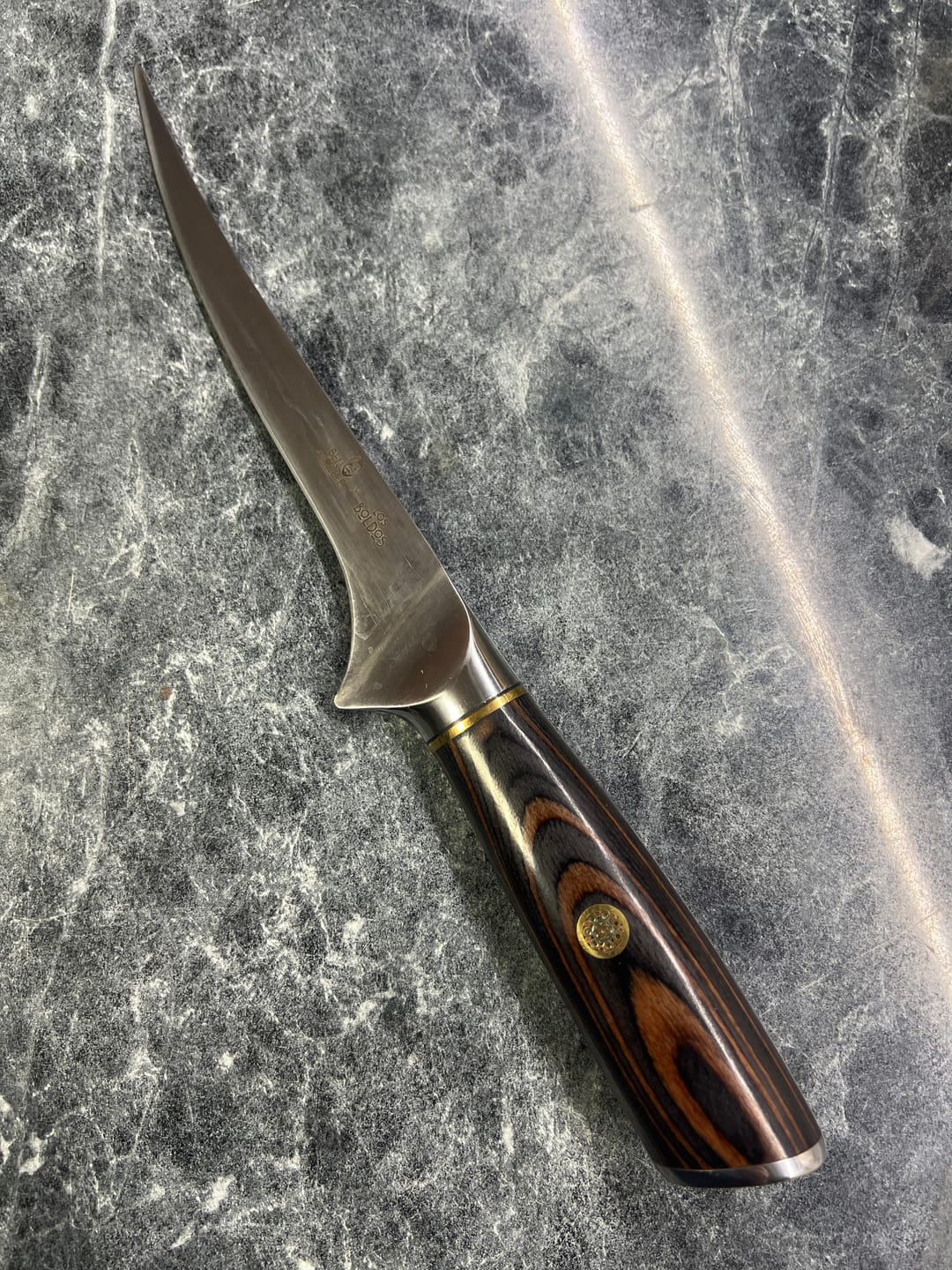 Customer photo review of Cuchillo Fileteador Japonés de Acero Alemán con Mango de Pakka
