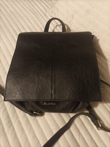 Reseña con foto de un cliente sobre Mochila Diseño Costuras