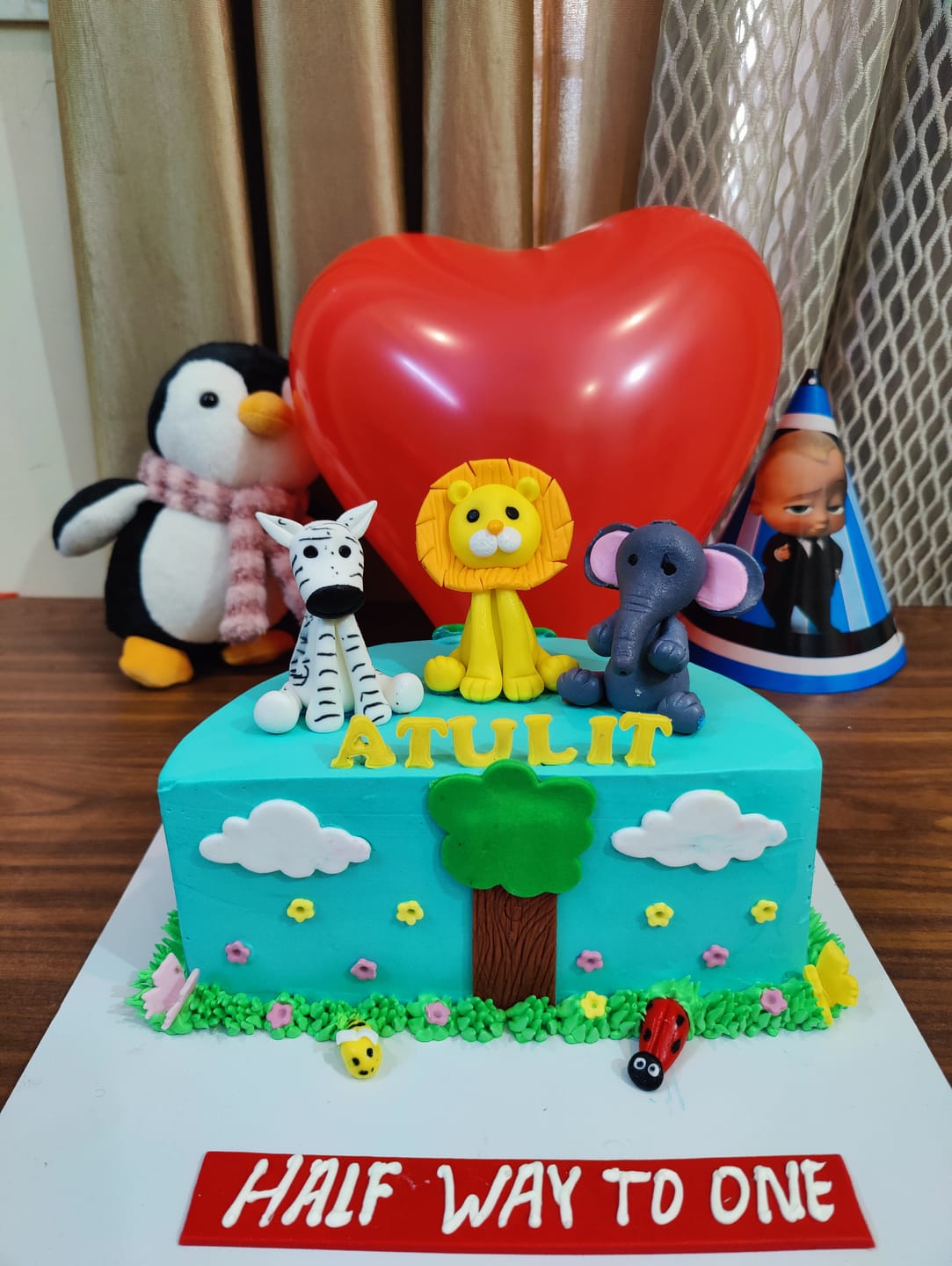Customer photo review of Half Jungle Design Cake