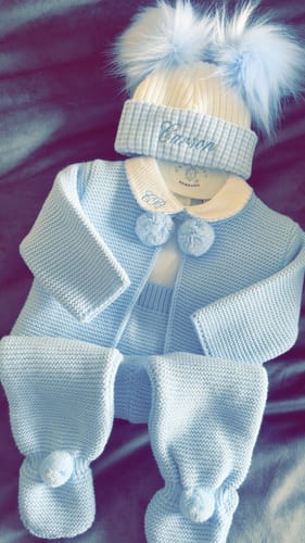 Kayleigh H. review of White & Blue Stripe Double Pom Hat image 1 out of 1