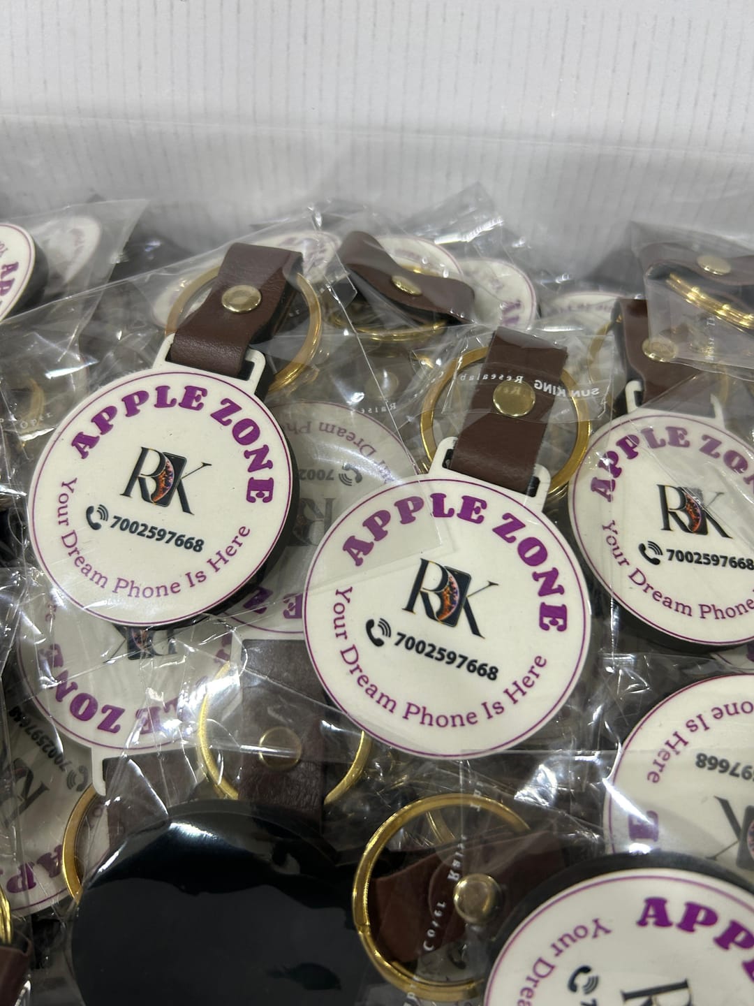 Customer photo review of Customized Premium Belt Keychains | Best for Brand Promotion | PrintMine.in