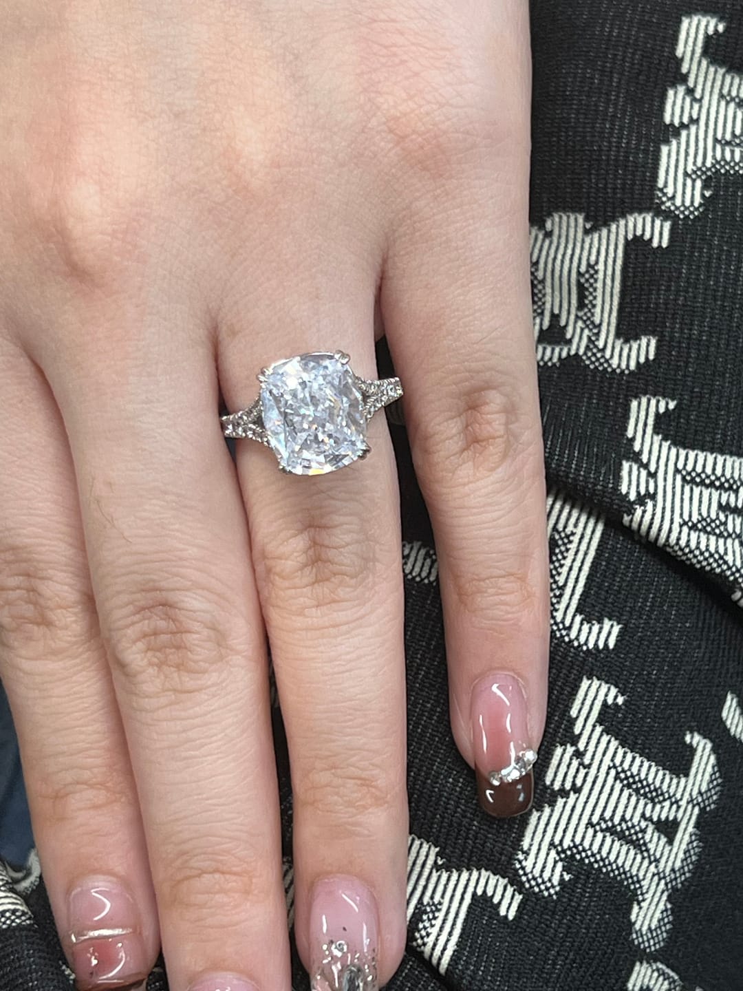 Customer photo review of S925 7.0Ct/4.0Ct Split Shank Cushion Cut Engagement Ring 18K White Gold Plated Travel Rings with Pavé Accents