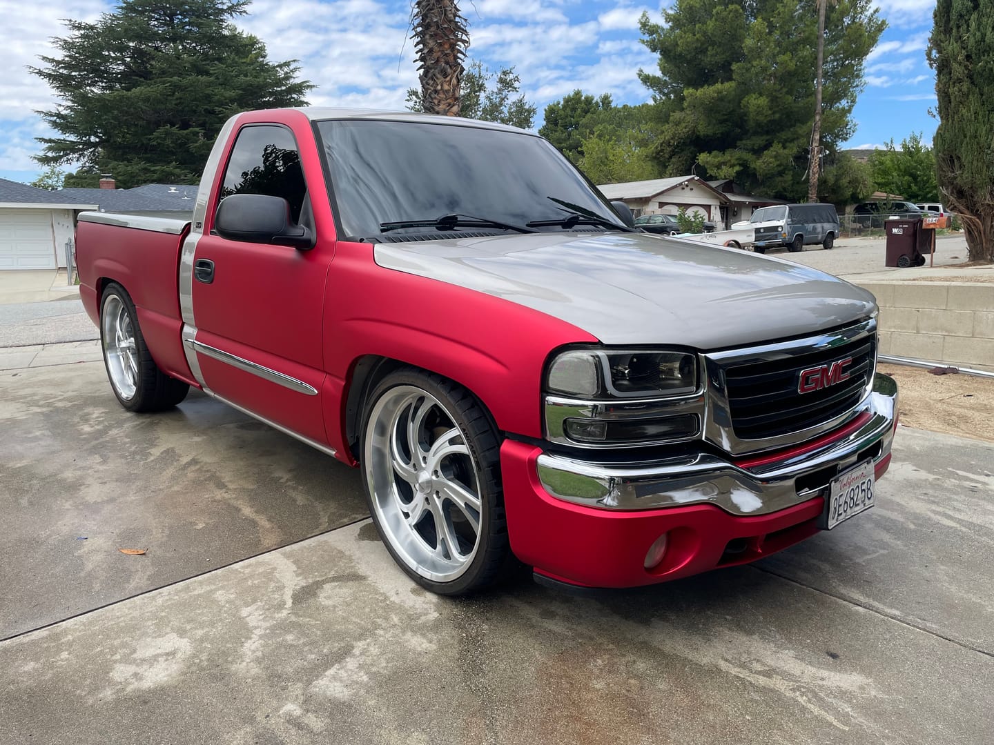 Customer photo review of Satin Chrome Prismatic Red Vinyl Wrap