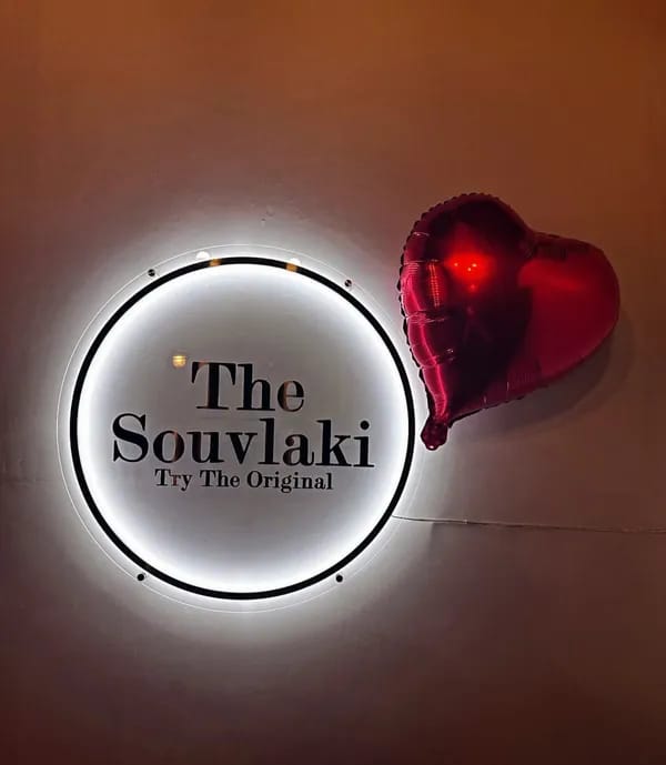 Customer photo review of Acrylic Backlit Business Signs