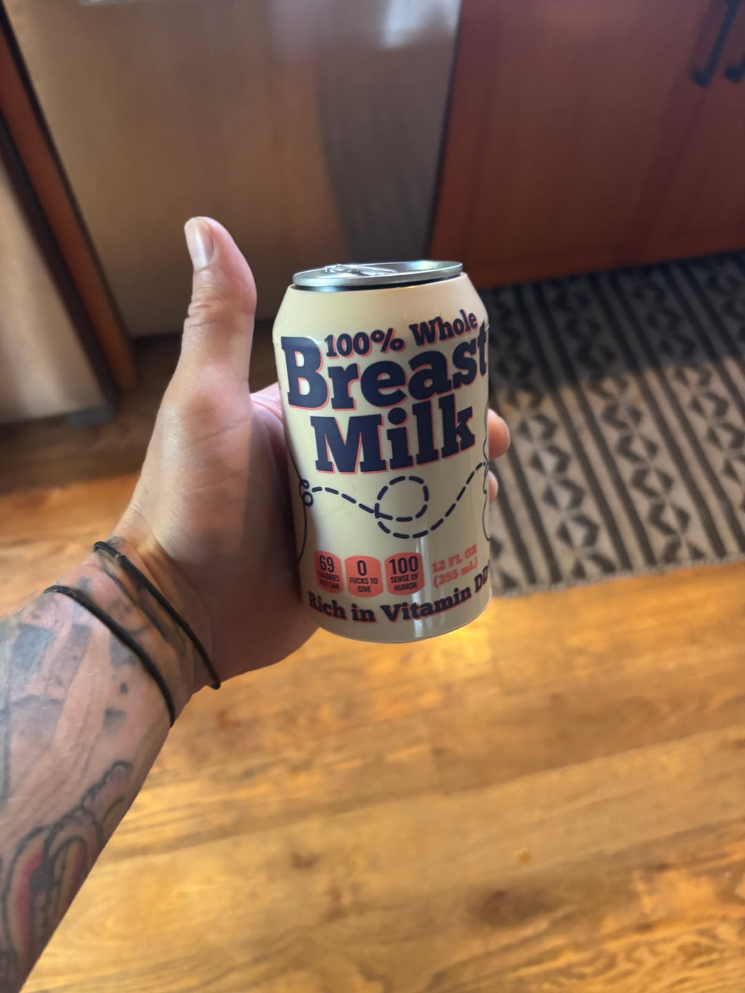 Customer photo review of Breast Milk Beersy Silicone Sleeve Hide-a-Beer Can Cooler