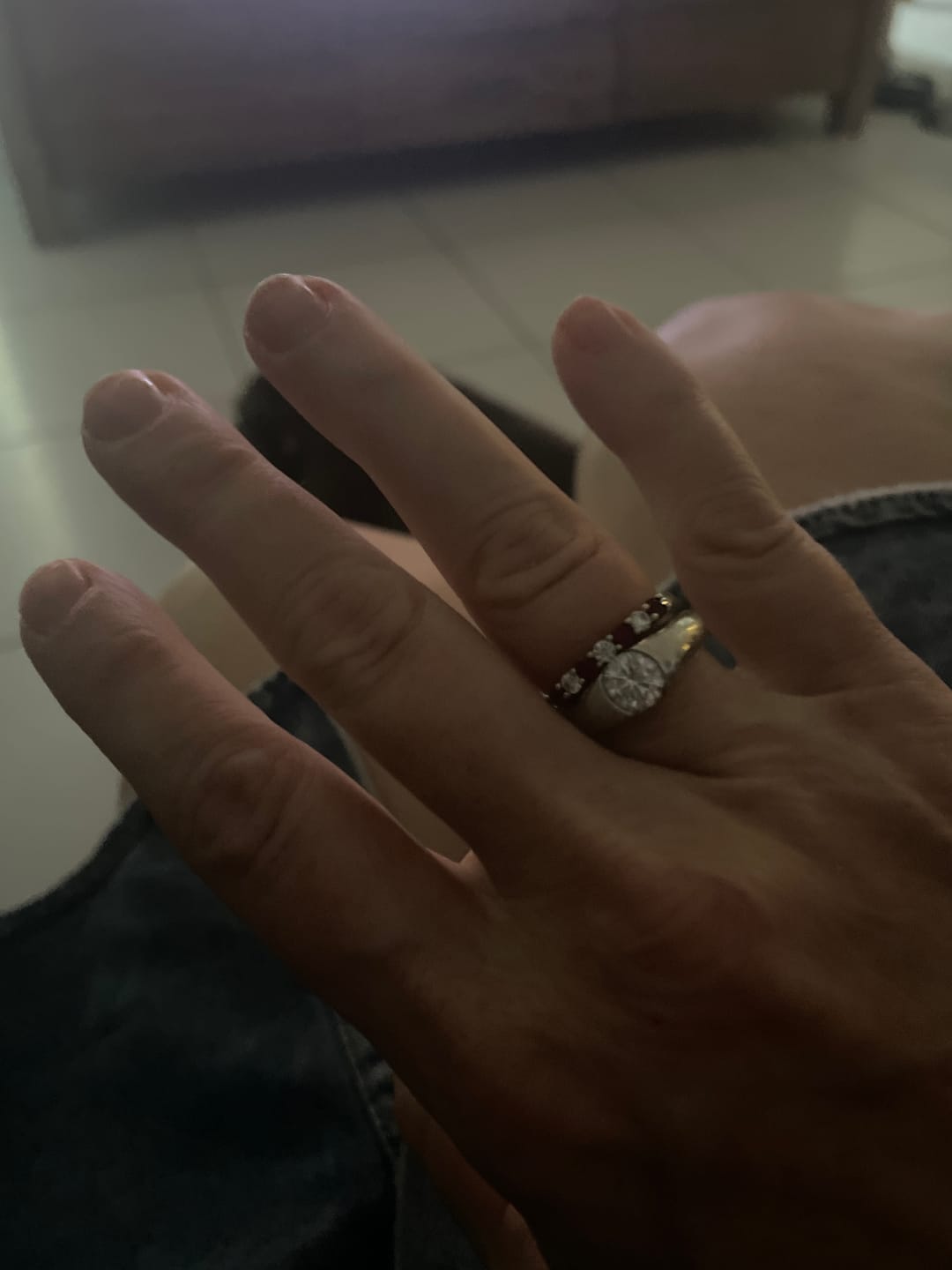 Customer photo review of Seven Stone Moissanite and Ruby Wedding Band Ring In Sterling Silver