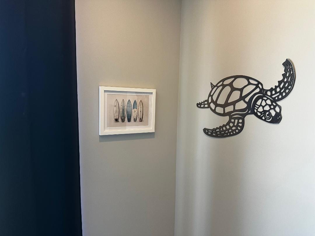 Customer photo review of Surfboard Wall Art in Blues and Tans