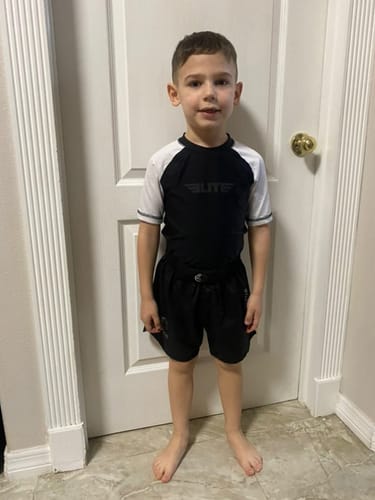 Customer photo review of Standard White Short Sleeve No-Gi Kids BJJ Rash Guard