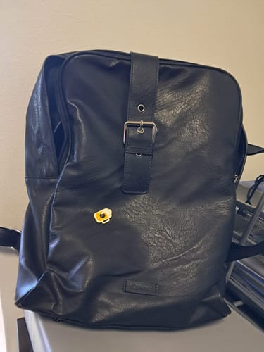 Reseña con foto de un cliente sobre Mochila Notebook Hebilla
