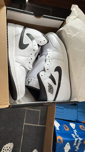 Customer photo review of Air Jordan 1 Mid White Black