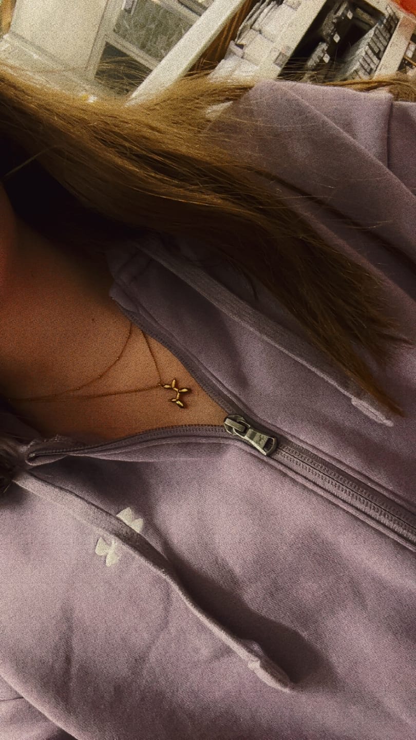 Customer photo review of Gold Balloon Animal Necklace