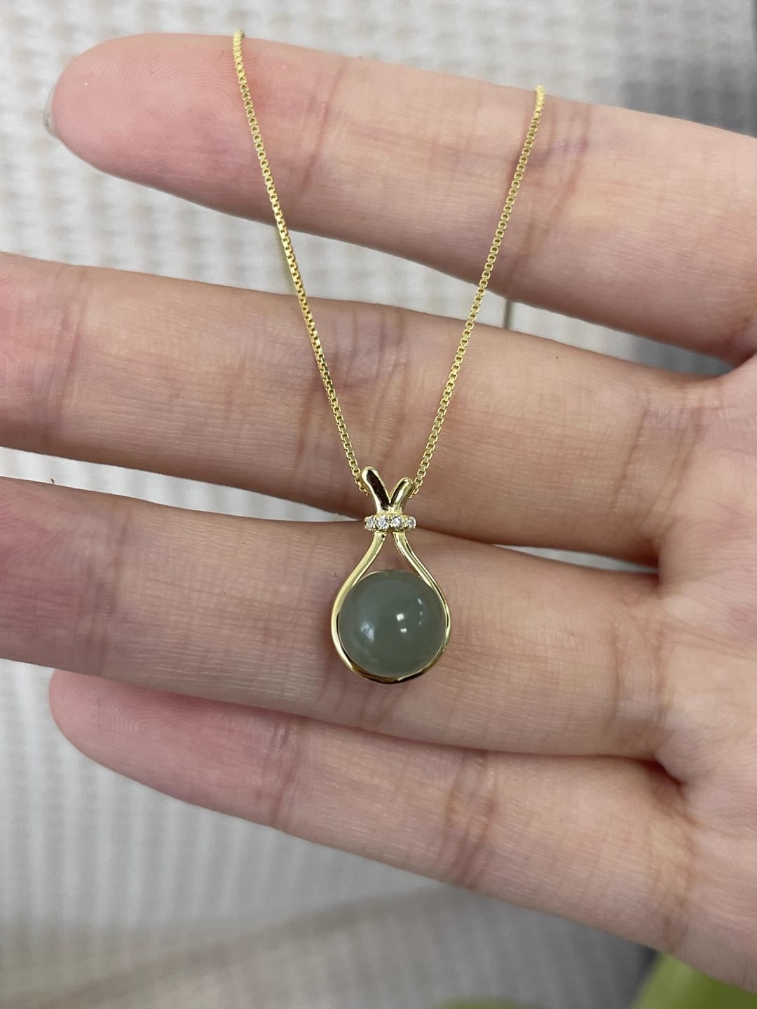 Customer photo review of Jade Fortune Pouch Necklace