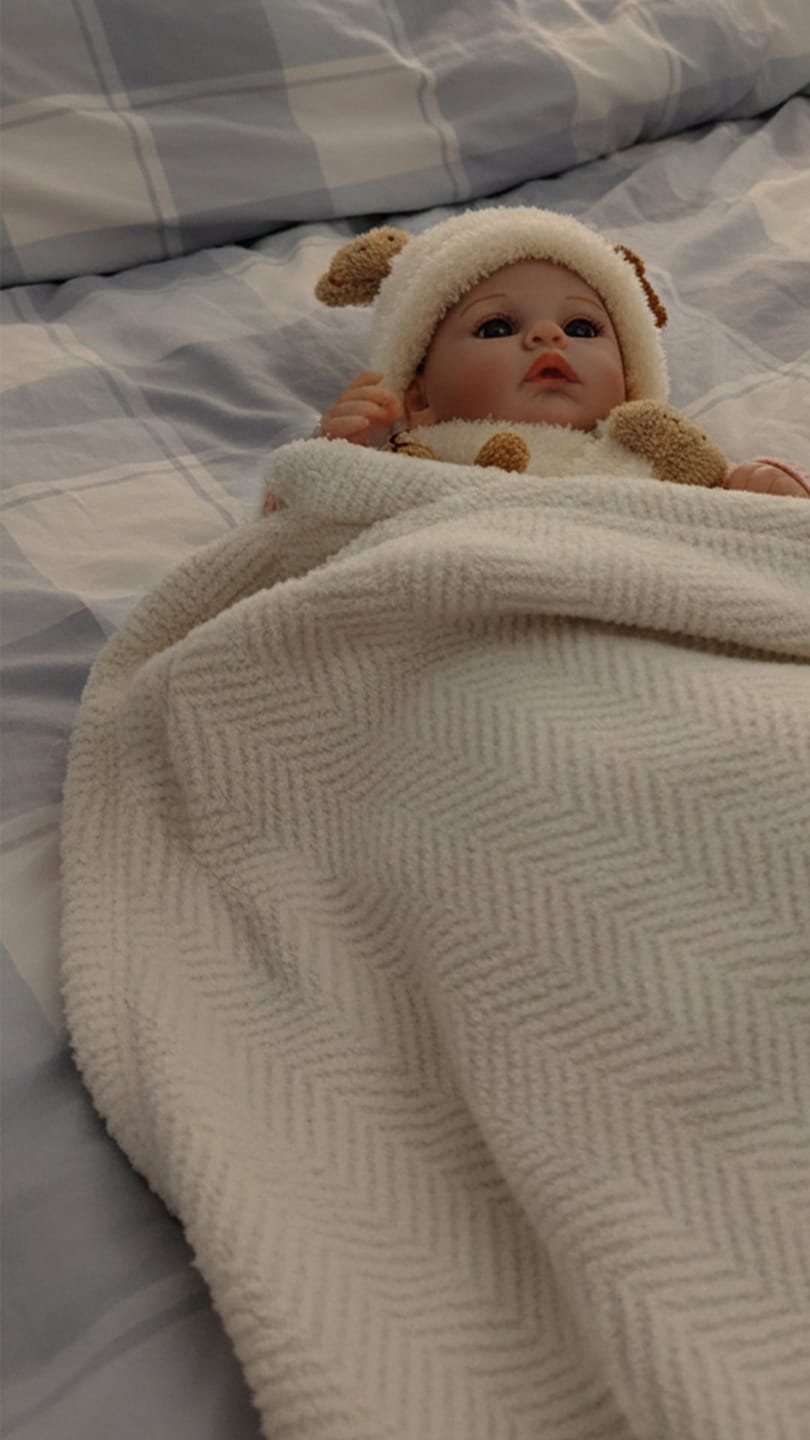 Customer photo review of Ava - Lifelike Reborn Baby Doll (20")