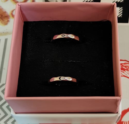 Customer photo review of Silver Sun & Moon Couple Bands