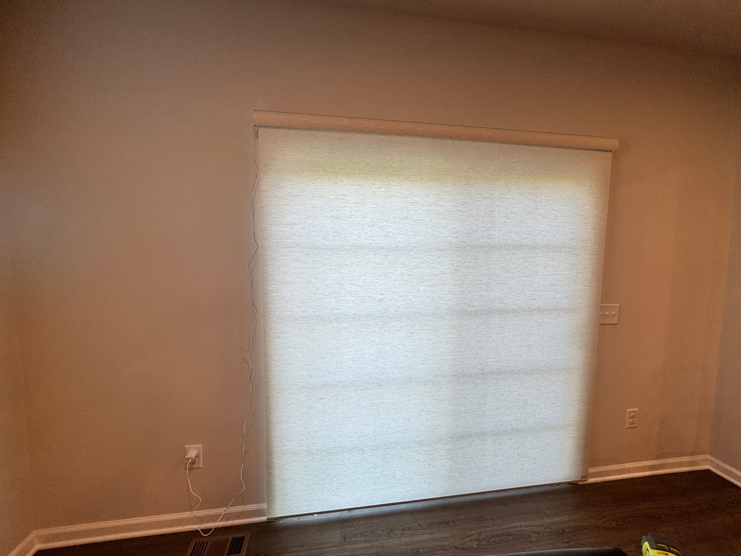 Customer photo review of SmartWings Motorized Light Filtering Roller Shades 70% Blackout Linen