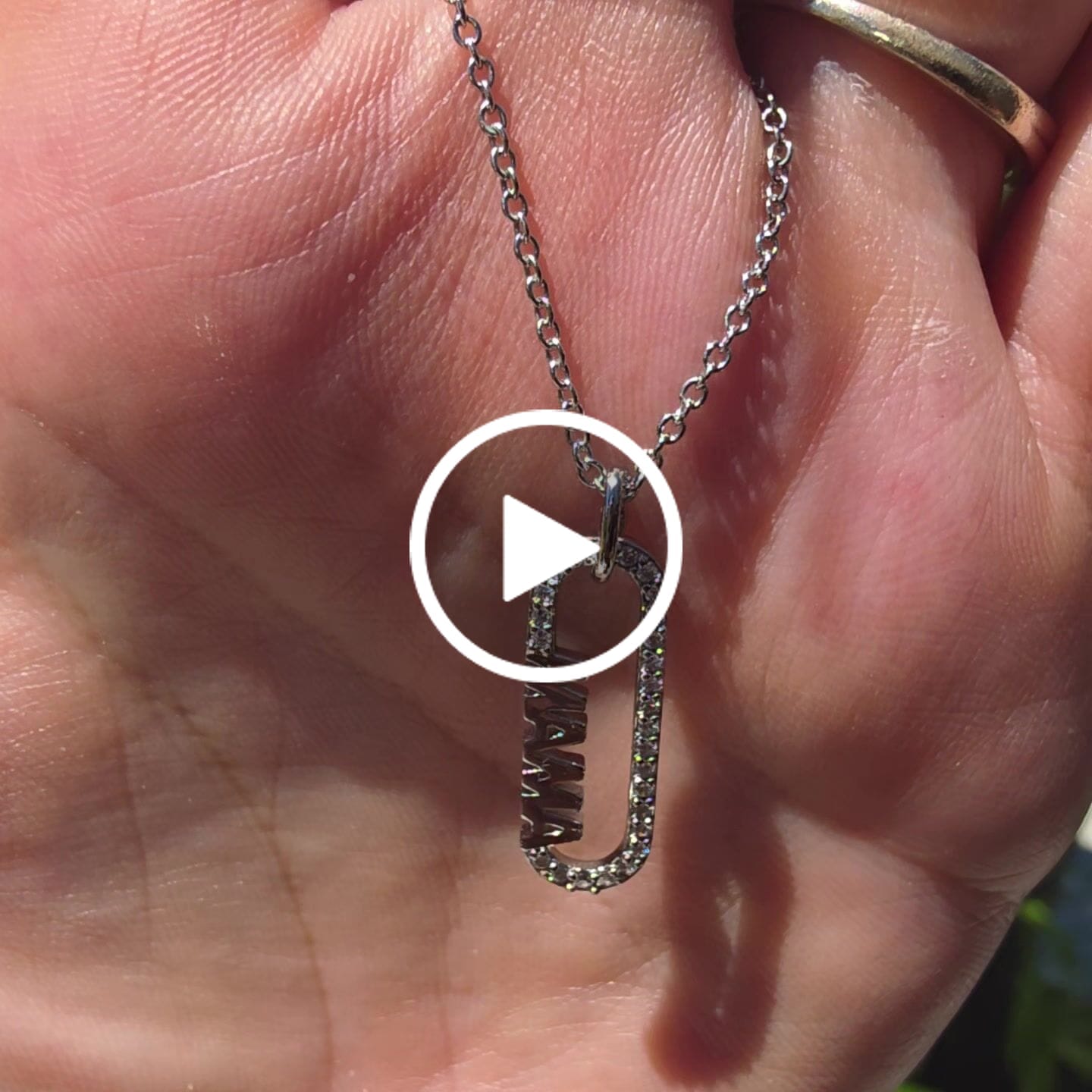 Customer video review of Elaine 18k White Gold Plated Mama Pendant Necklace with Simulated Diamond Crystals