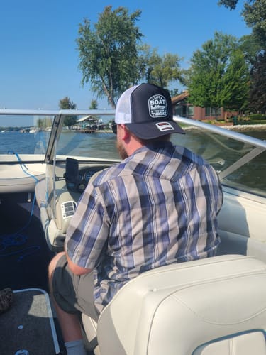 Customer photo review of I Got A Boat Trucker Hat