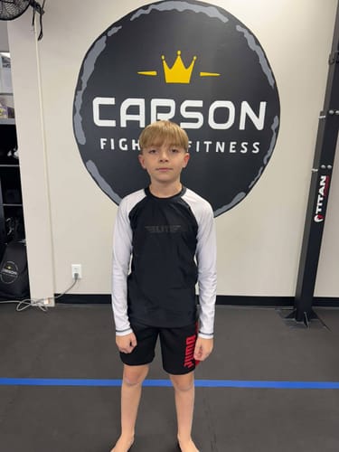 Customer photo review of Standard White Long Sleeve No-Gi Kids BJJ Rash Guard