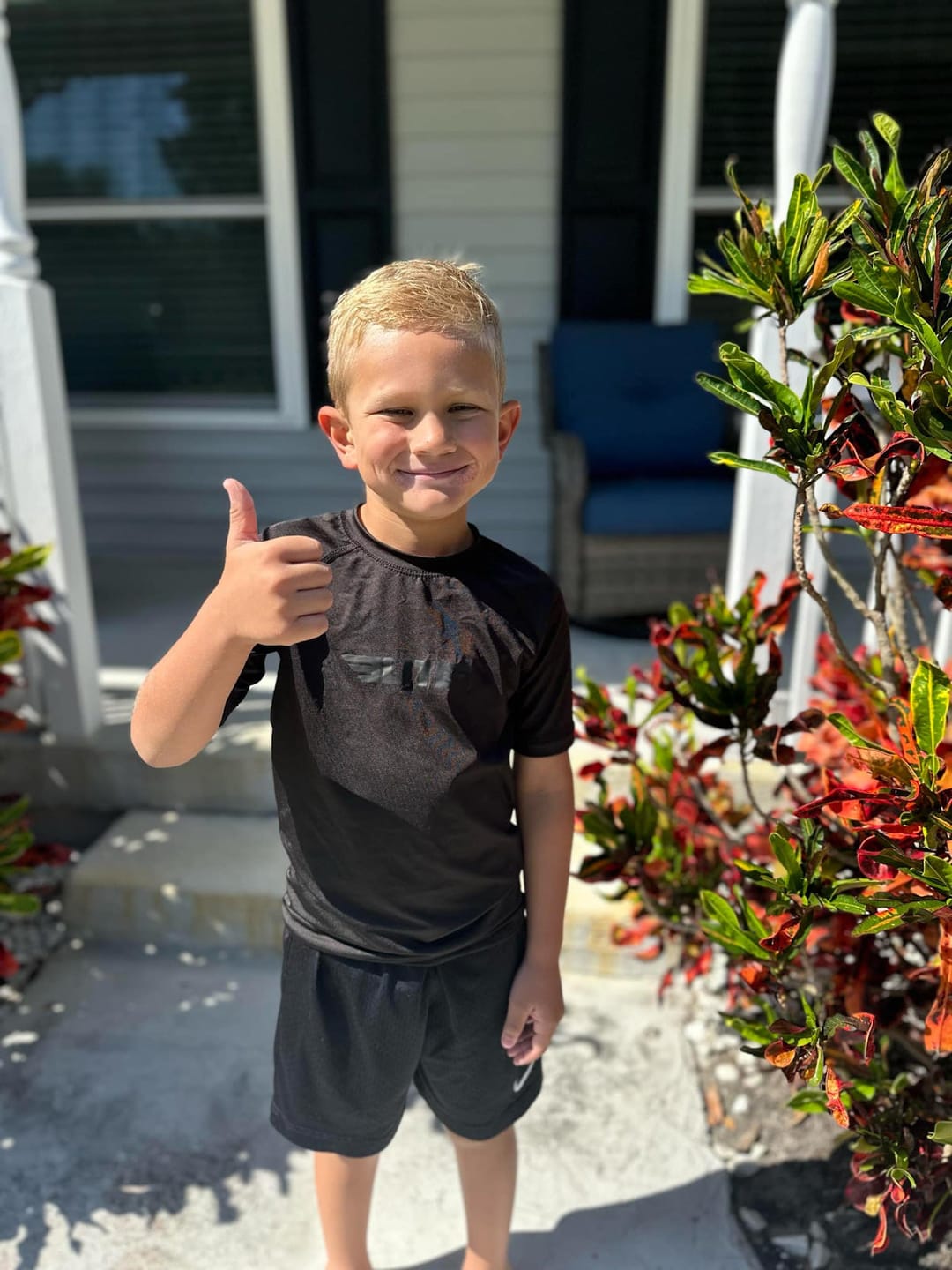 Customer photo review of Standard Black Short Sleeve No-Gi Kids BJJ Rash Guard
