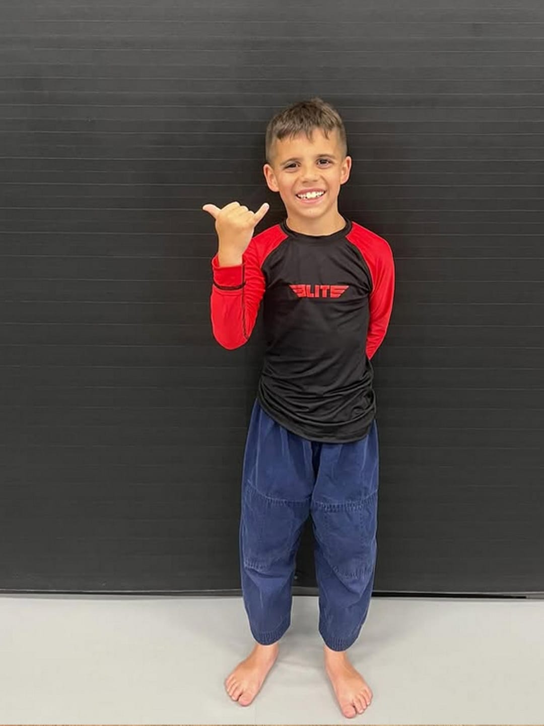 Customer photo review of Standard Red Long Sleeve No-Gi Kids BJJ Rash Guard