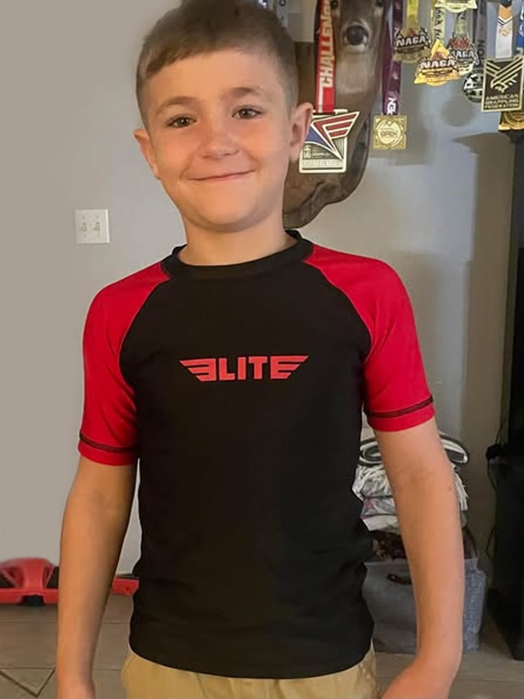 Customer photo review of Standard Red Short Sleeve No-Gi Kids BJJ Rash Guard