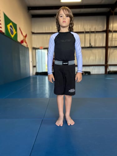 Customer photo review of Standard White Long Sleeve No-Gi Kids BJJ Rash Guard