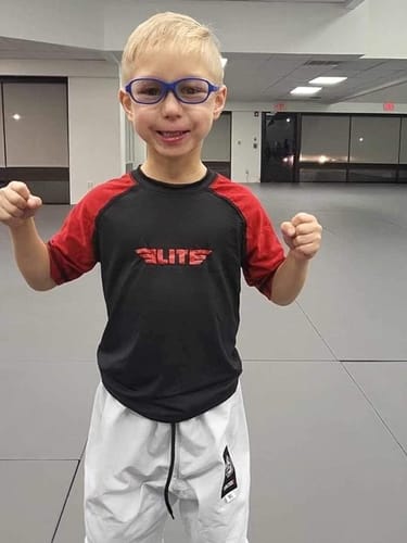 Customer photo review of Standard Red Short Sleeve No-Gi Kids BJJ Rash Guard
