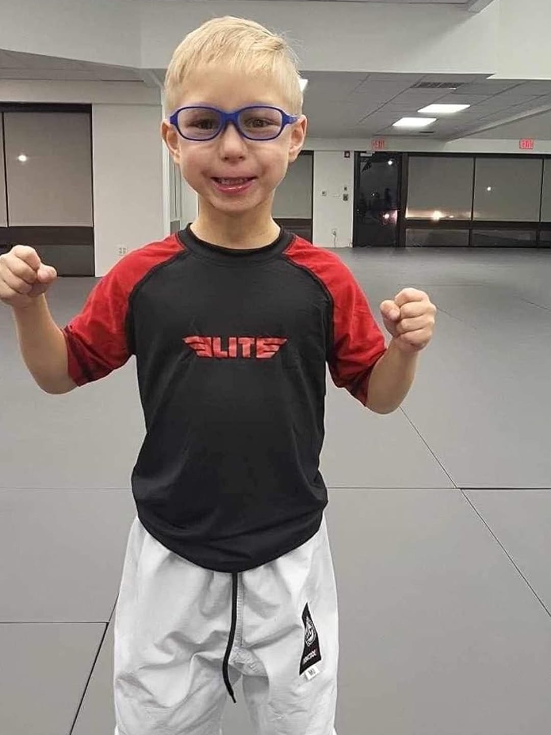 Customer photo review of Standard Red Short Sleeve No-Gi Kids BJJ Rash Guard
