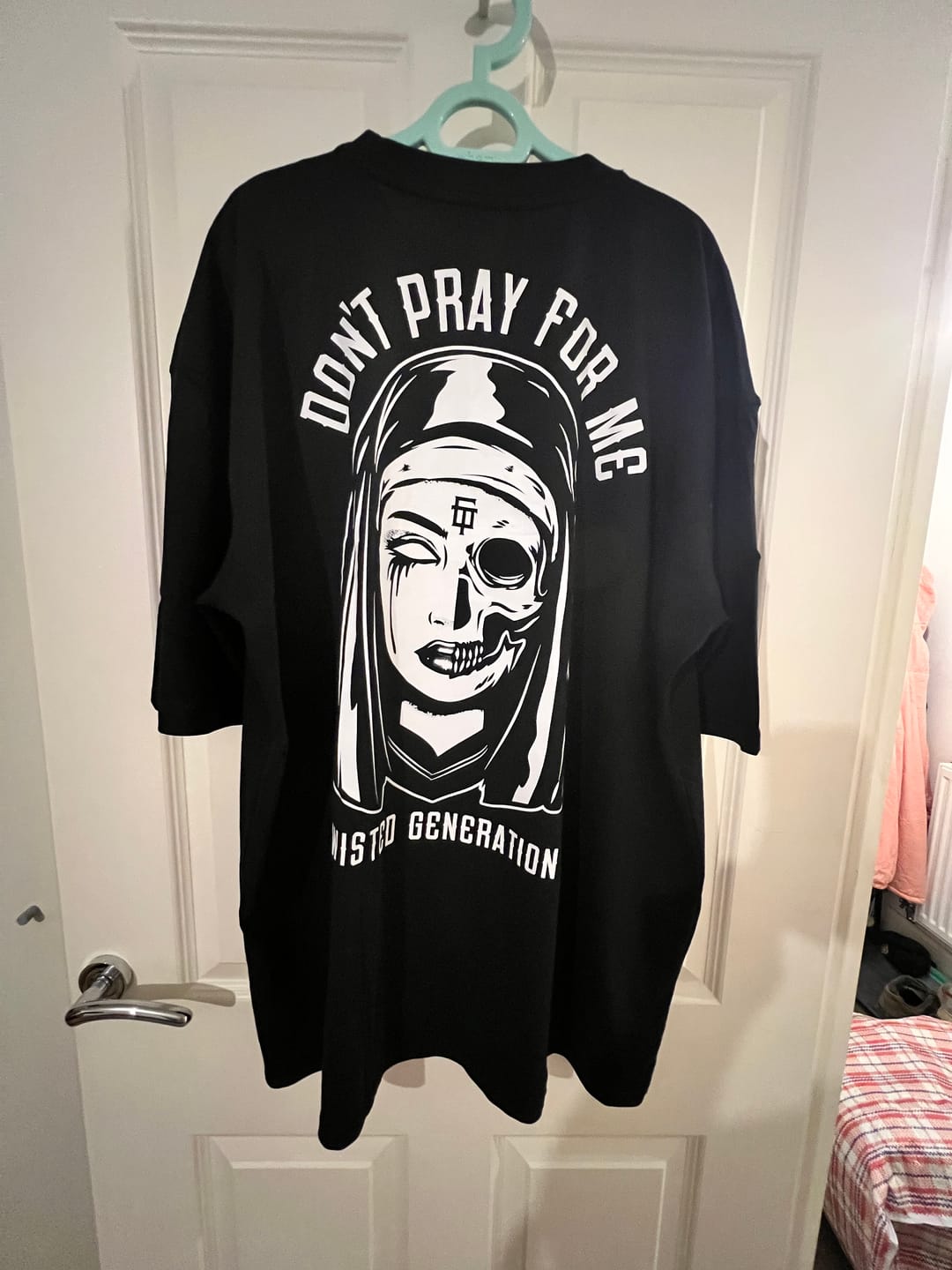 Customer photo review of Nun Oversized T-shirt - Don't Pray For Me