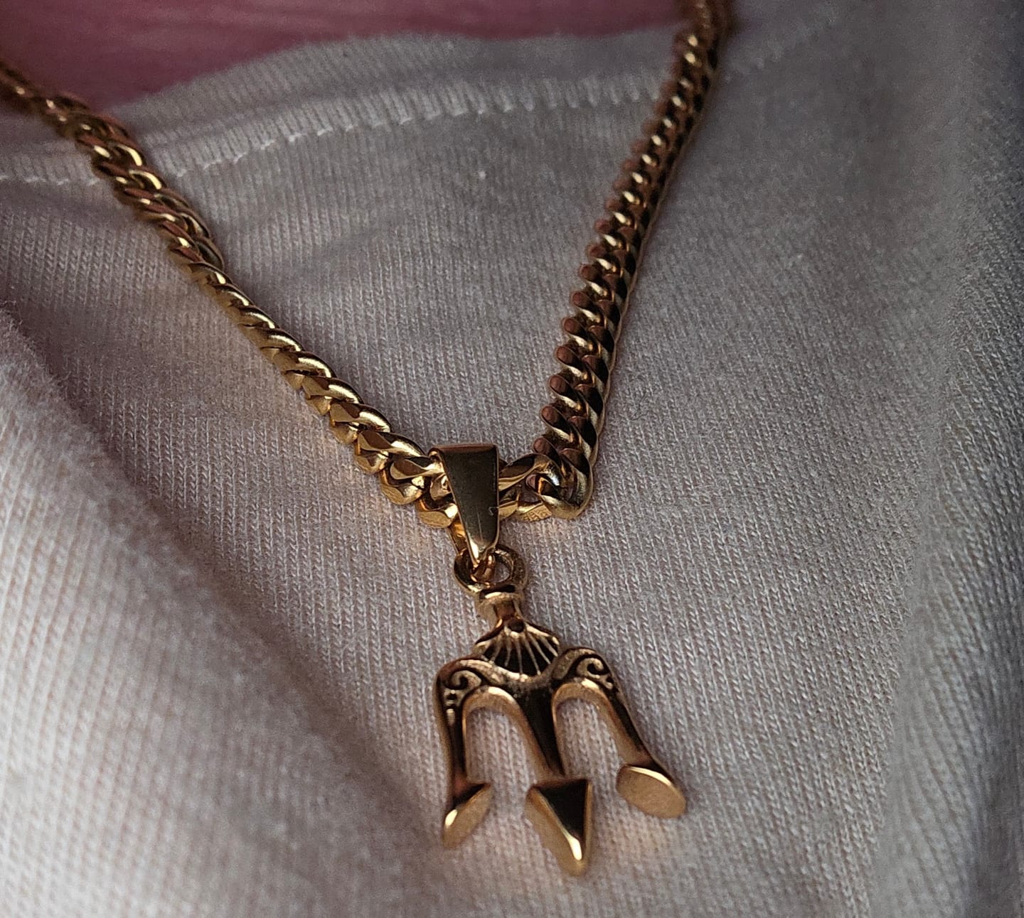 Customer photo review of TRIDENT PENDANT (GOLD)