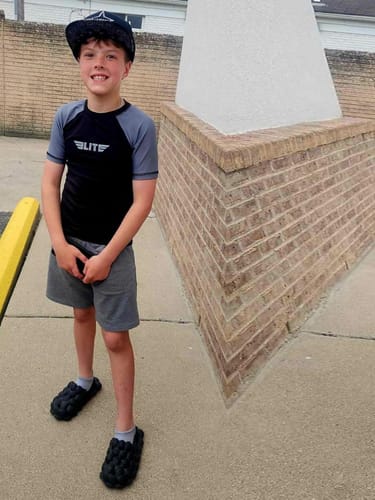 Customer photo review of Standard Gray Short Sleeve No-Gi Kids BJJ Rash Guard