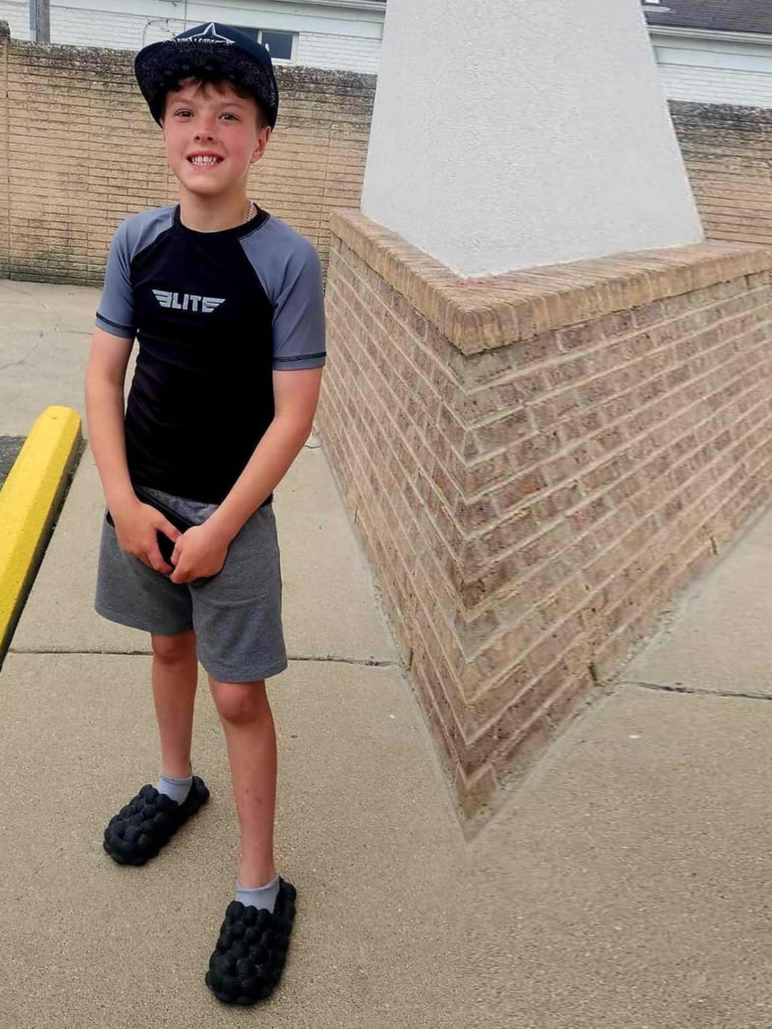 Customer photo review of Standard Gray Short Sleeve No-Gi Kids BJJ Rash Guard