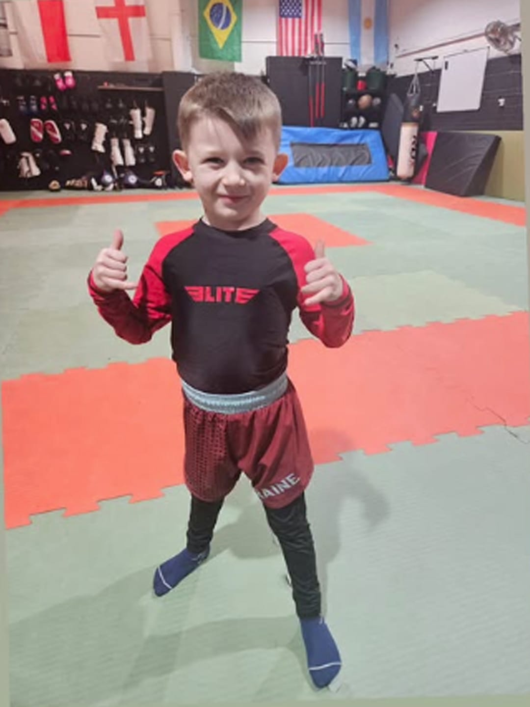 Customer photo review of Standard Red Long Sleeve No-Gi Kids BJJ Rash Guard